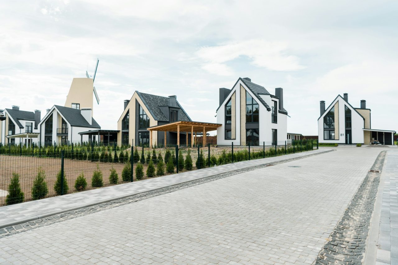 street-with-new-modern-and-luxury-houses-near-green-plants-and-trees.jpg
